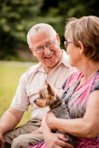 Senior couple with dog