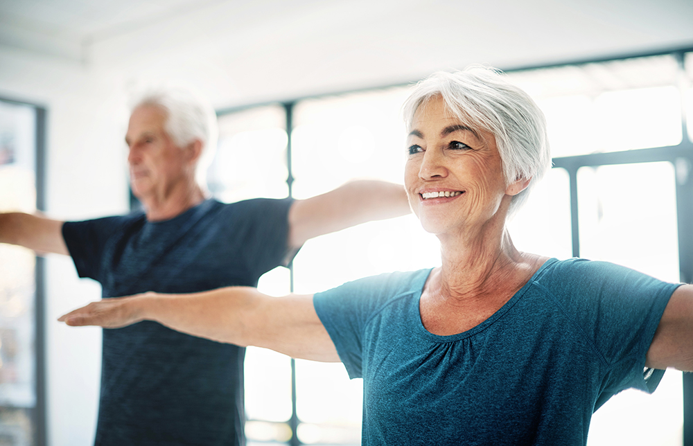 Alavida Lifestyles Senior couple doing yoga